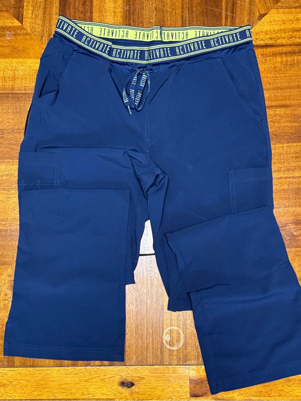 Med Couture Navy Boot Cut Cargo Scrub Pants with Branded Waistband. Medium tall